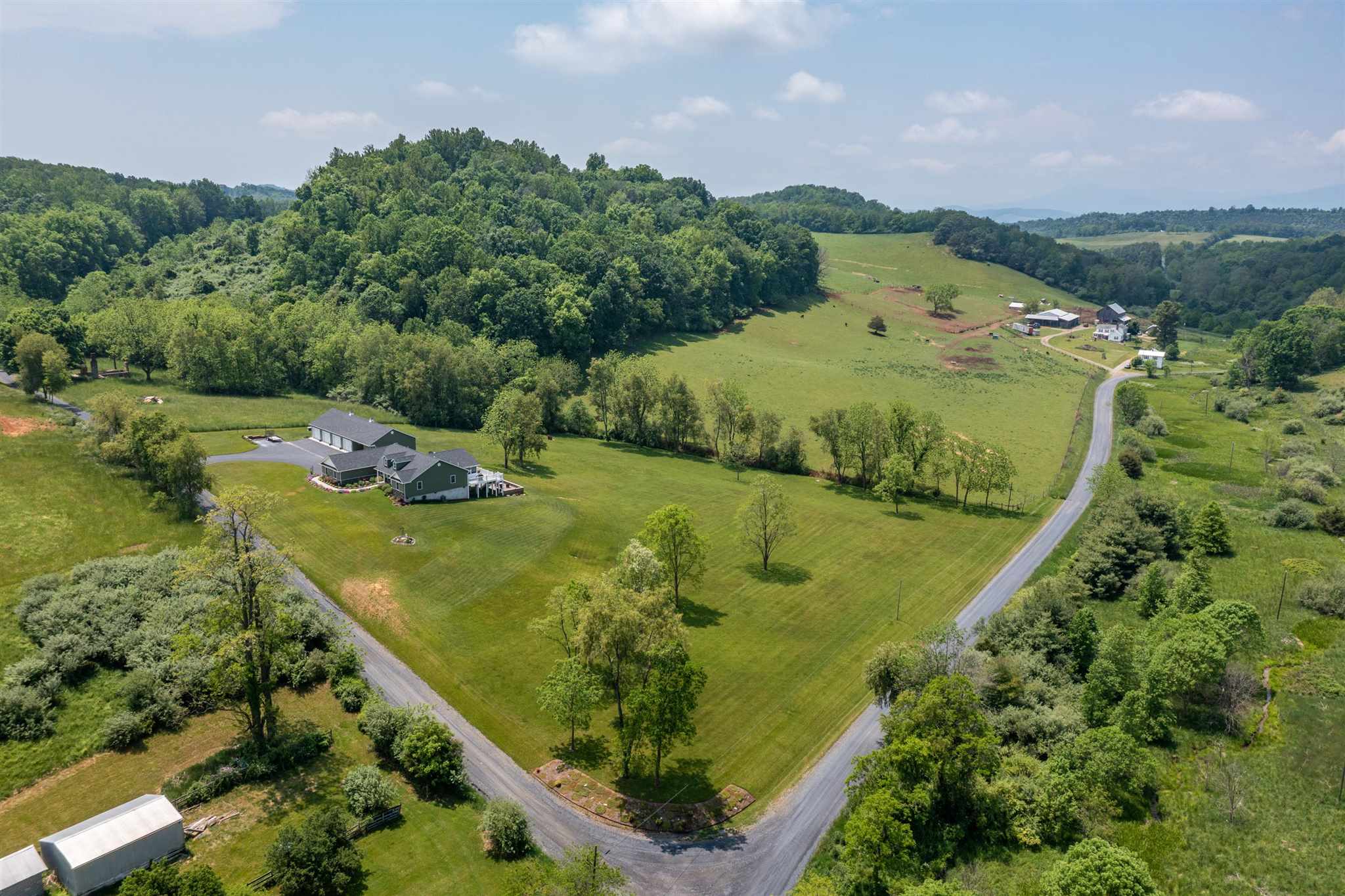 212 Lyles Road Raphine, VA 24472 - Photo 9 of 69 a view of a lake with a yard