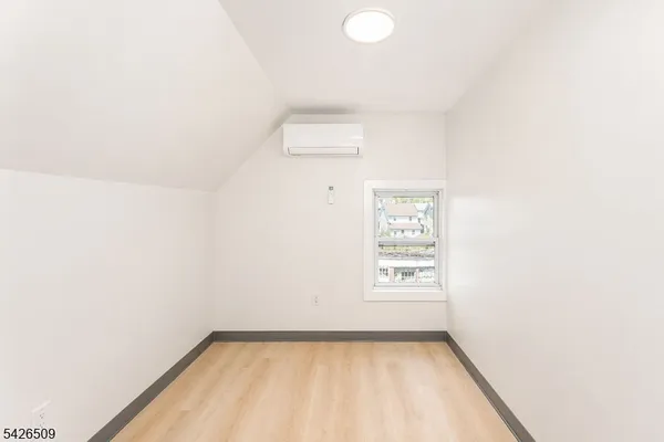 a view of a small space with a window