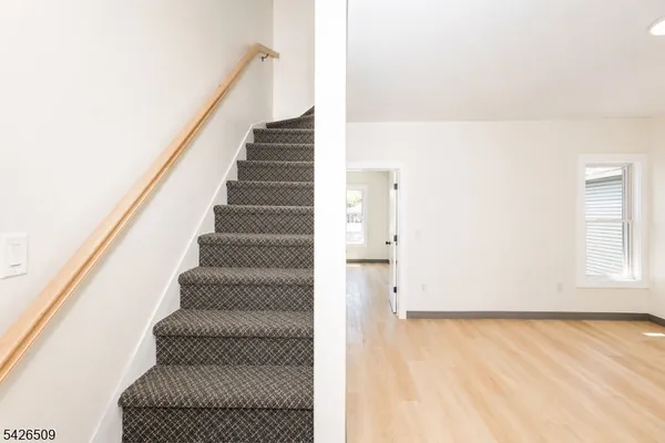 a view of an entryway with staircase
