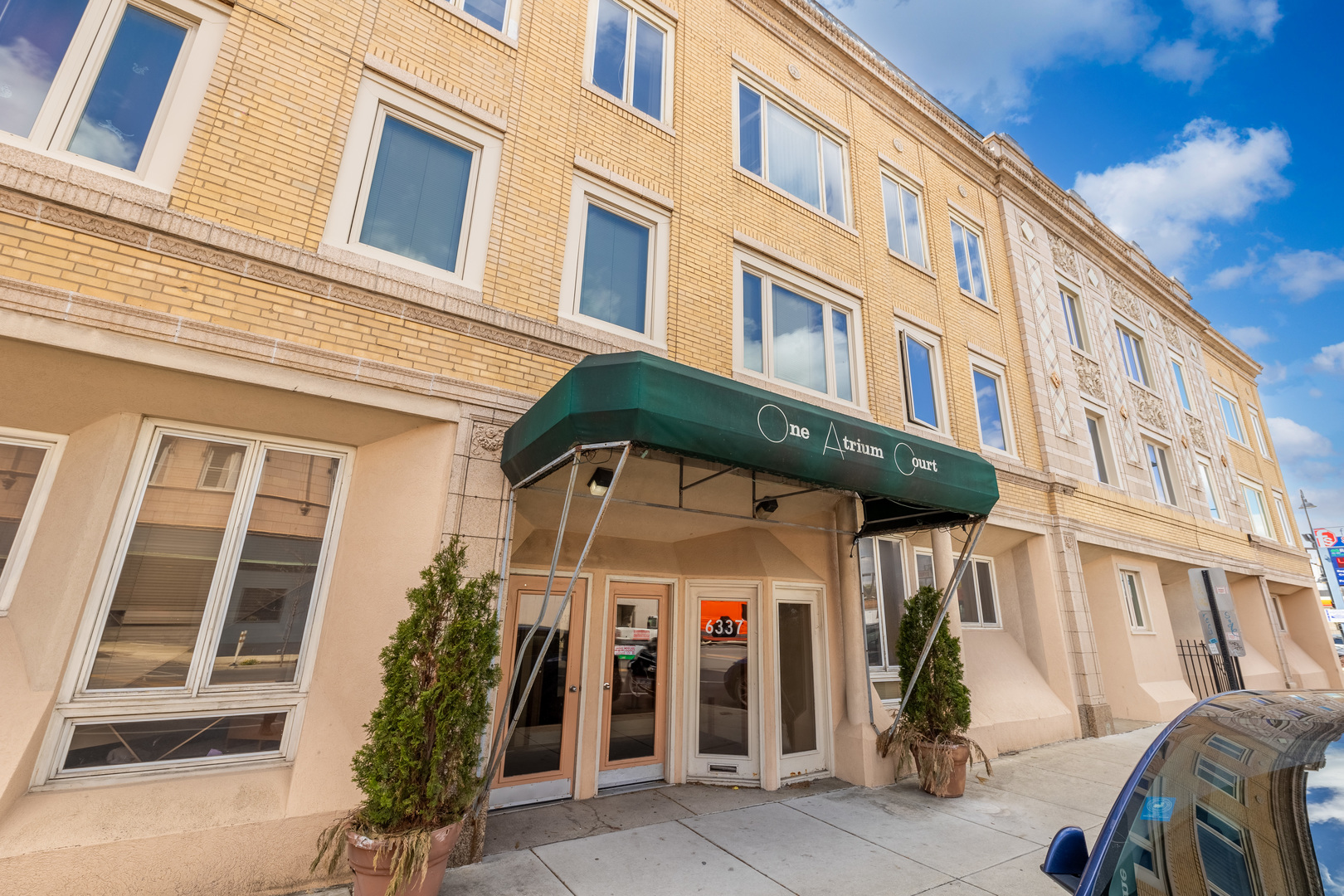 6337 Roosevelt Road, Unit 407 Berwyn, IL 60402 - Photo 1 of 30 a front view of a building
