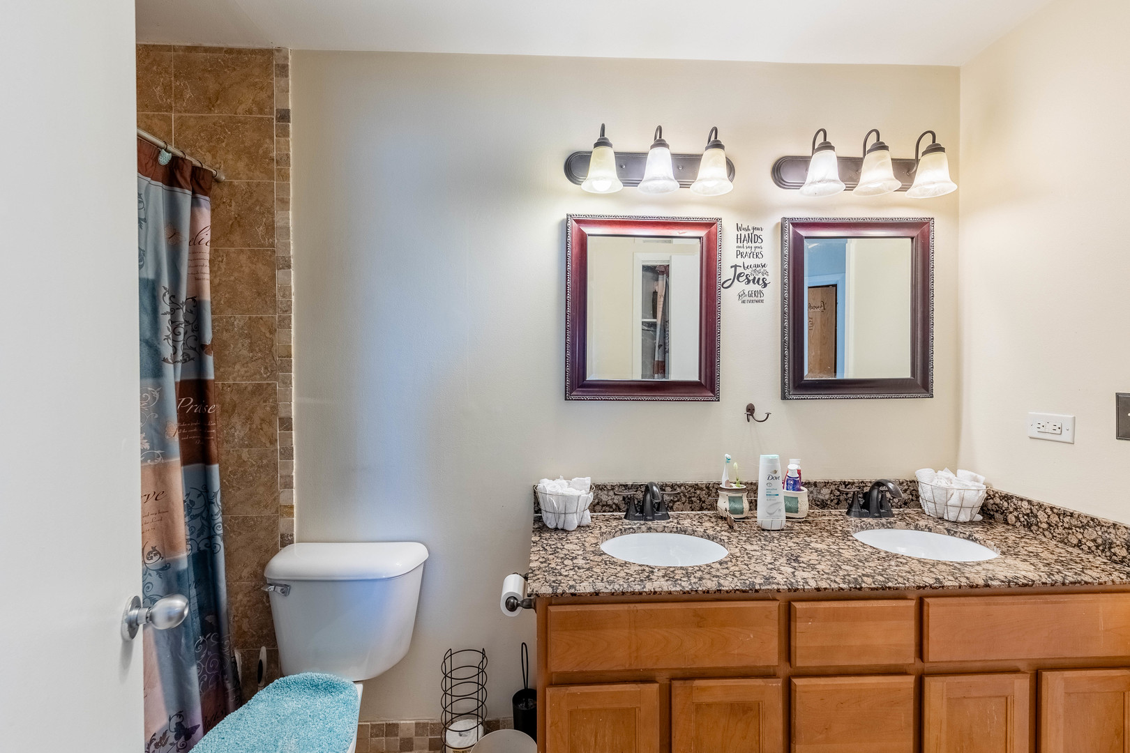 6337 Roosevelt Road, Unit 407 Berwyn, IL 60402 - Photo 16 of 30 a bathroom with a granite countertop toilet sink and mirror