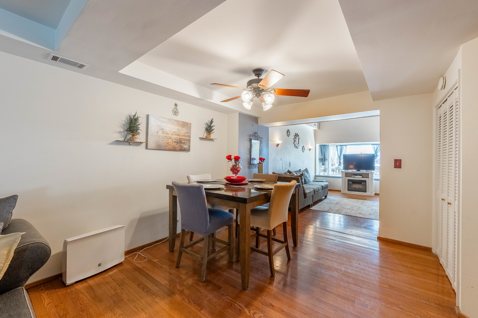 6337 Roosevelt Road, Unit 407 Berwyn, IL 60402 - Photo 5 of 30 a view of a dining room with furniture and wooden floor
