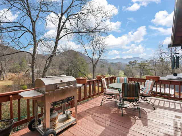 a view of a chairs and table in a patio