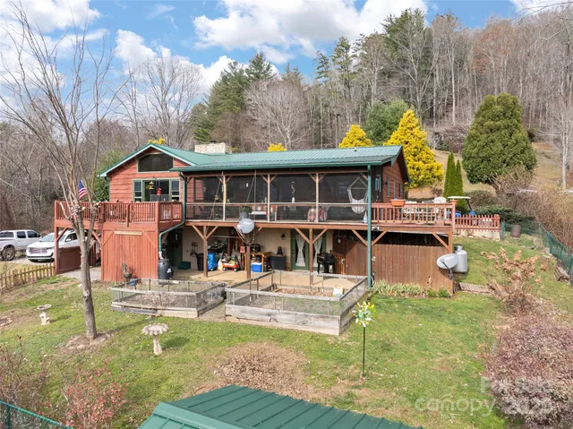 a view of a house with swimming pool
