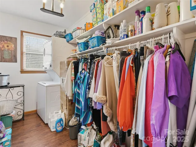 a room with pool table and windows