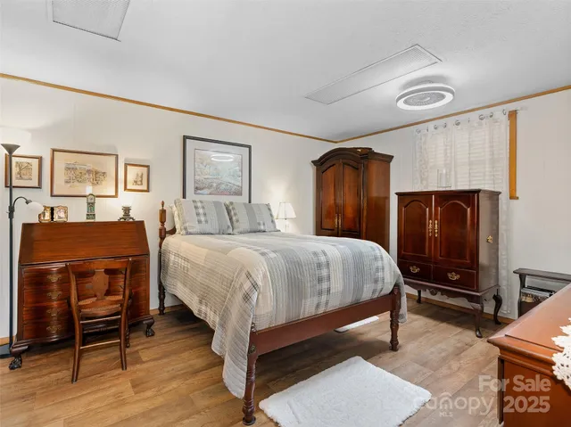 a bathroom with a sink vanity and a mirror