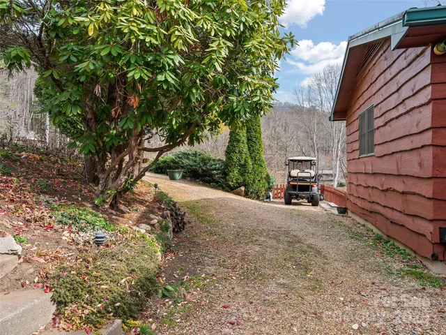 a view of backyard with truck parked