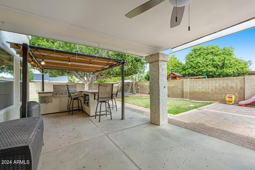 4258 East Decatur Street Mesa, AZ 85205 - Photo 18 of 24 back patio with grill