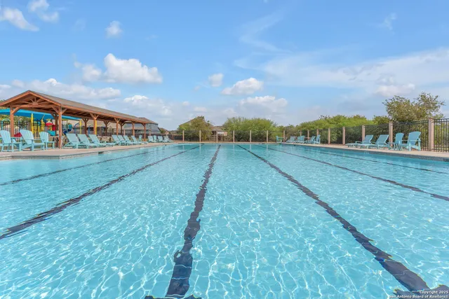 a view of a road with a big yard