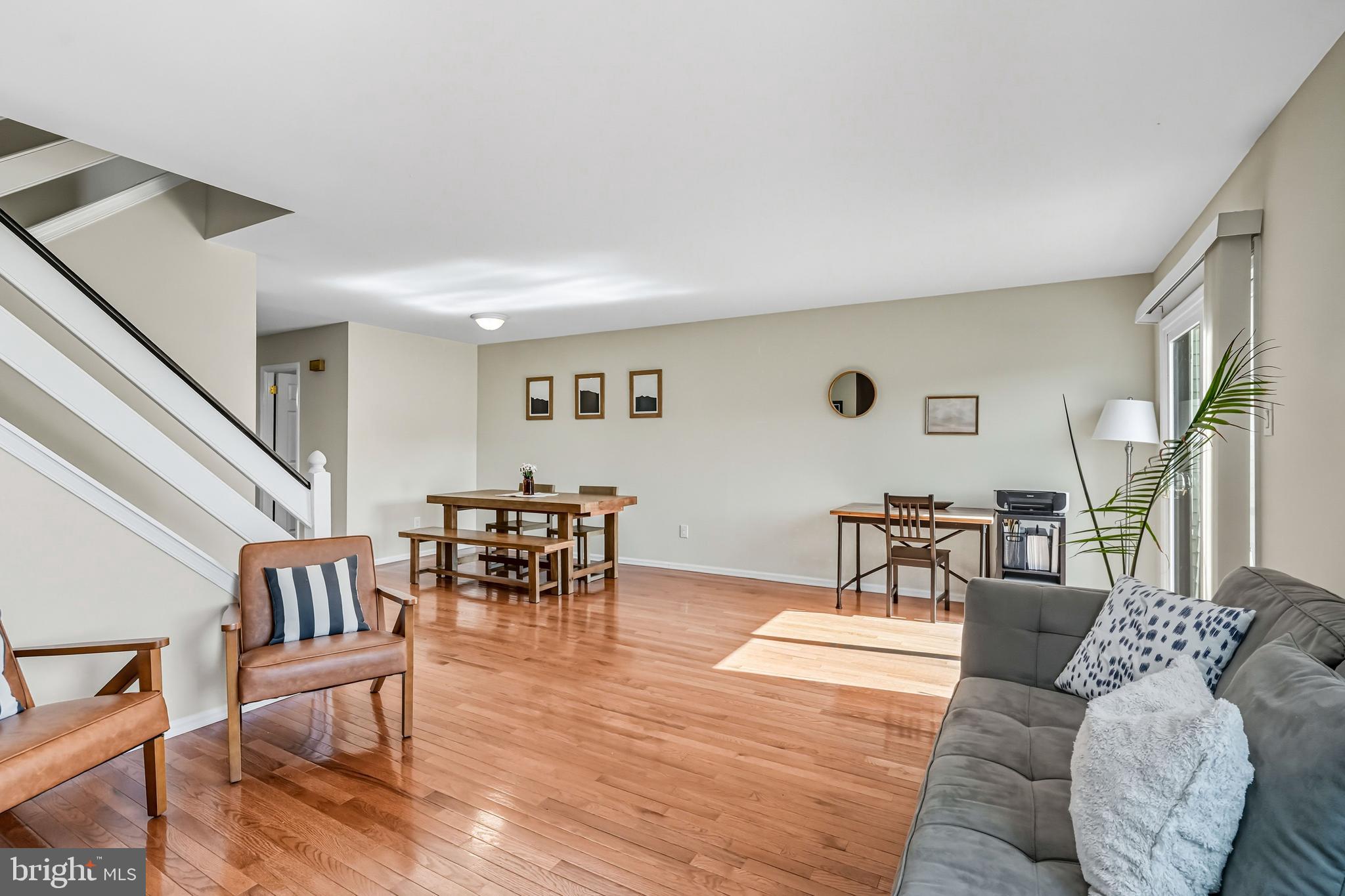303 Scola Road Brookhaven, PA 19015 - Photo 19 of 56 a living room with furniture and a table