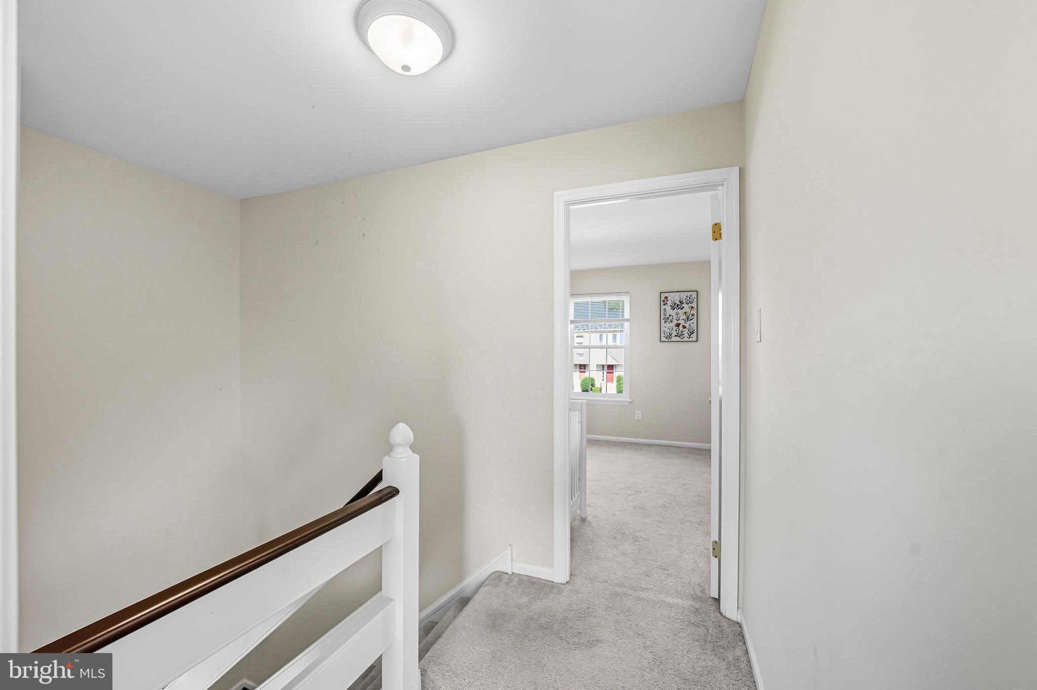 303 Scola Road Brookhaven, PA 19015 - Photo 23 of 56 a view of hallway with bathroom