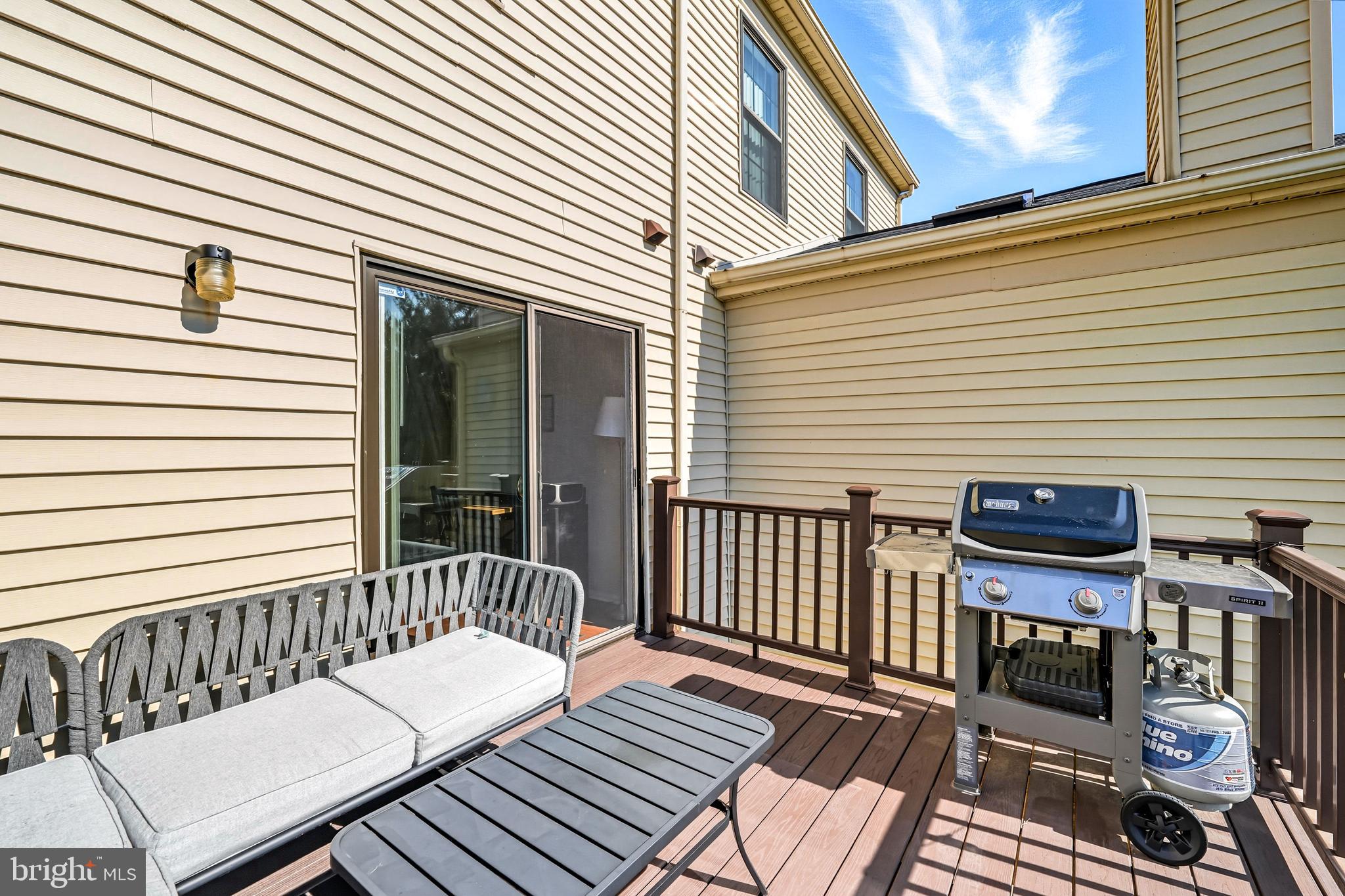 303 Scola Road Brookhaven, PA 19015 - Photo 39 of 56 a view of a wooden chairs on the deck