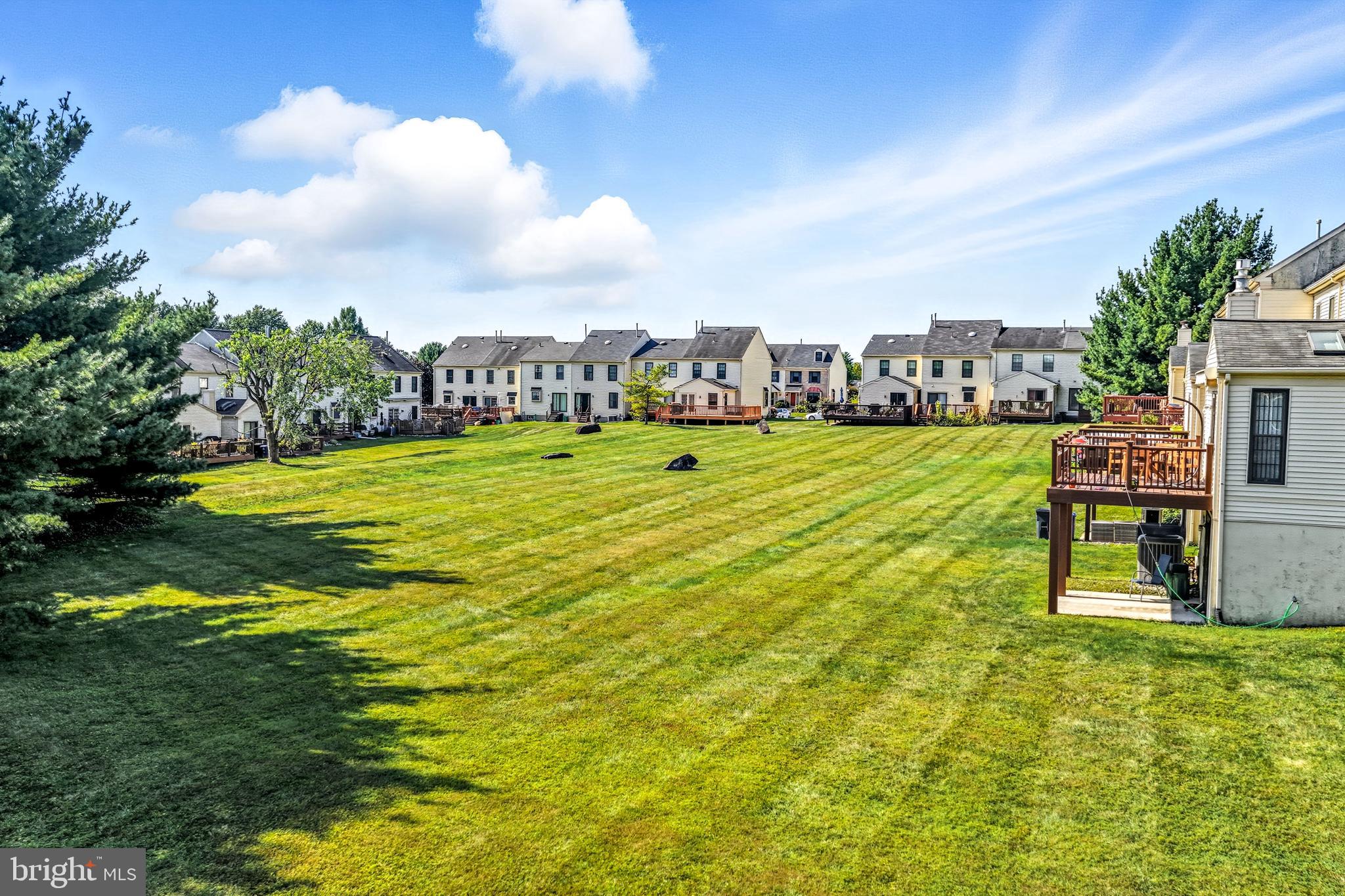 303 Scola Road Brookhaven, PA 19015 - Photo 41 of 56 a view of a big yard with table and chairs
