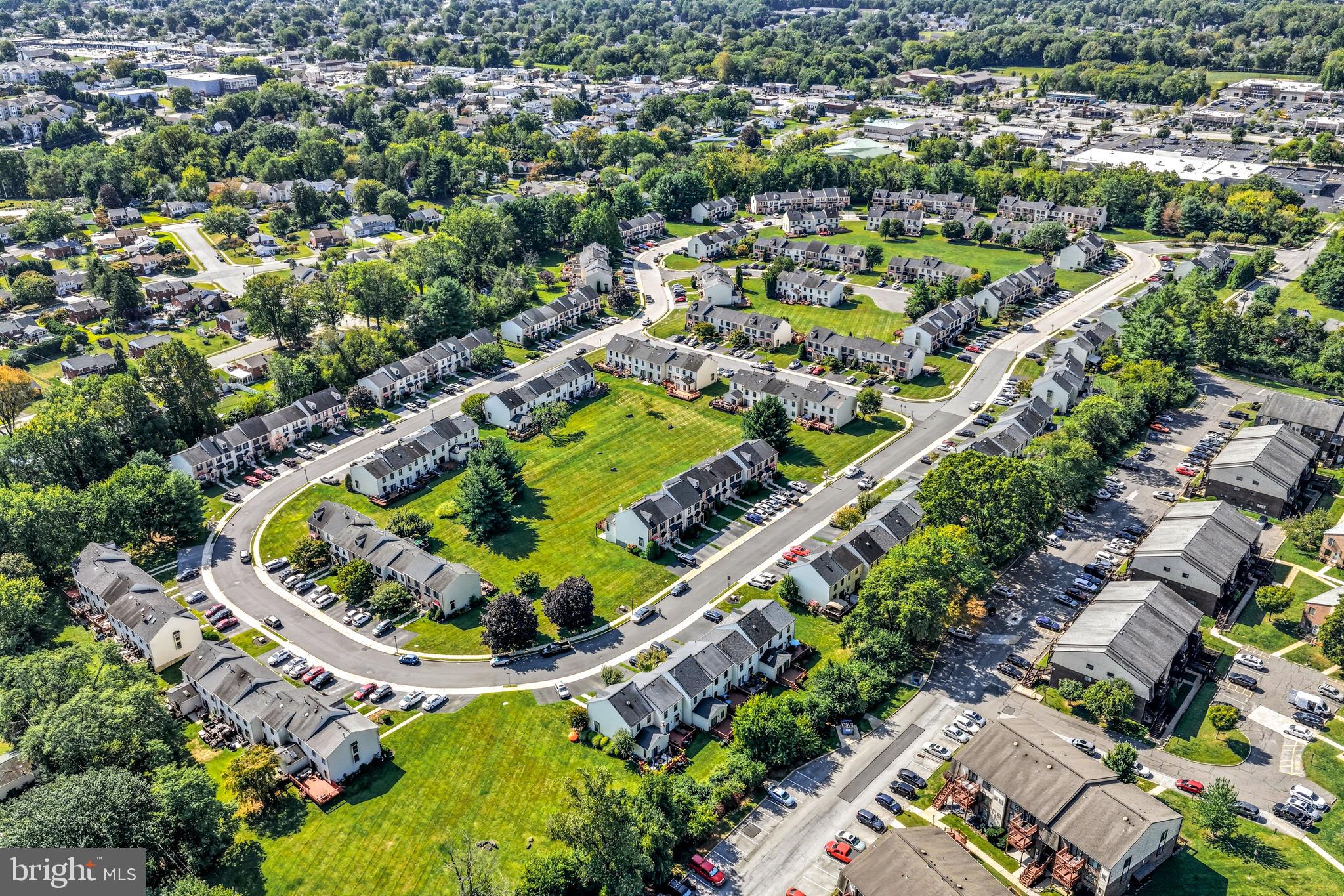 303 Scola Road Brookhaven, PA 19015 - Photo 54 of 56 an aerial view of a swimming pool and outdoor space