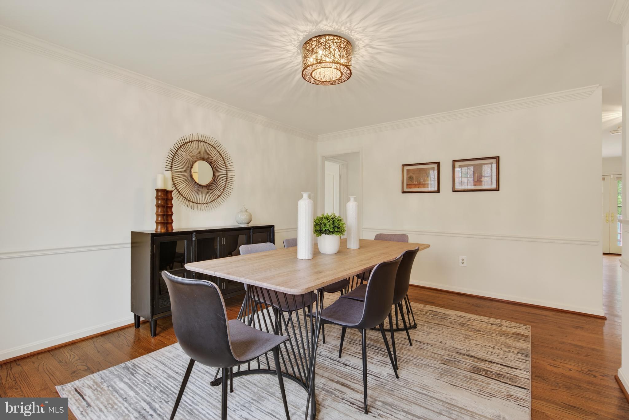 8901 Ellsworth Court Silver Spring, MD 20910 - Photo 6 of 43 a view of a dining room and a wooden floor