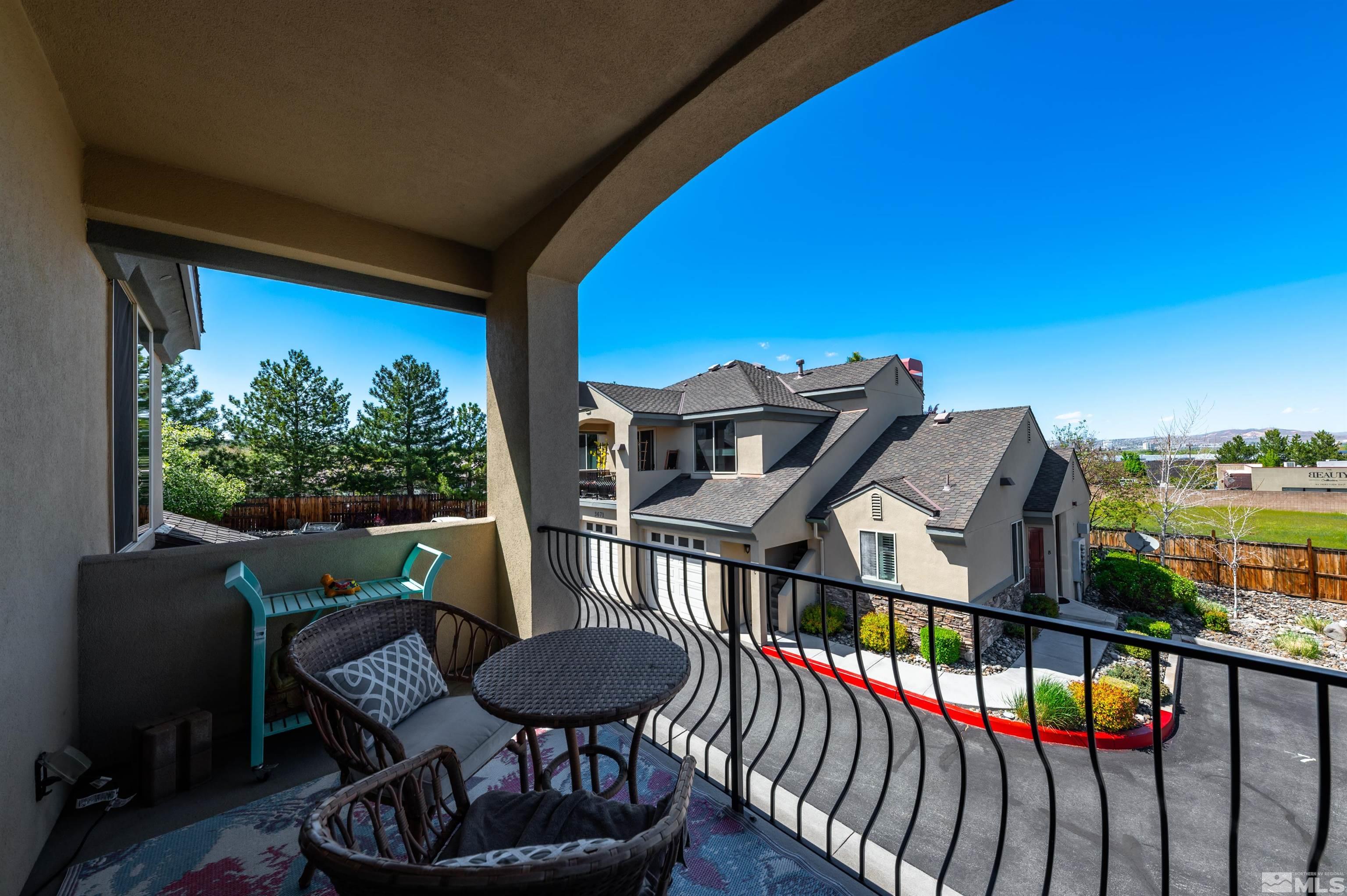 3677 Warren Way, Unit C Reno, NV 89509 - Photo 16 of 23 a view of a balcony with furniture
