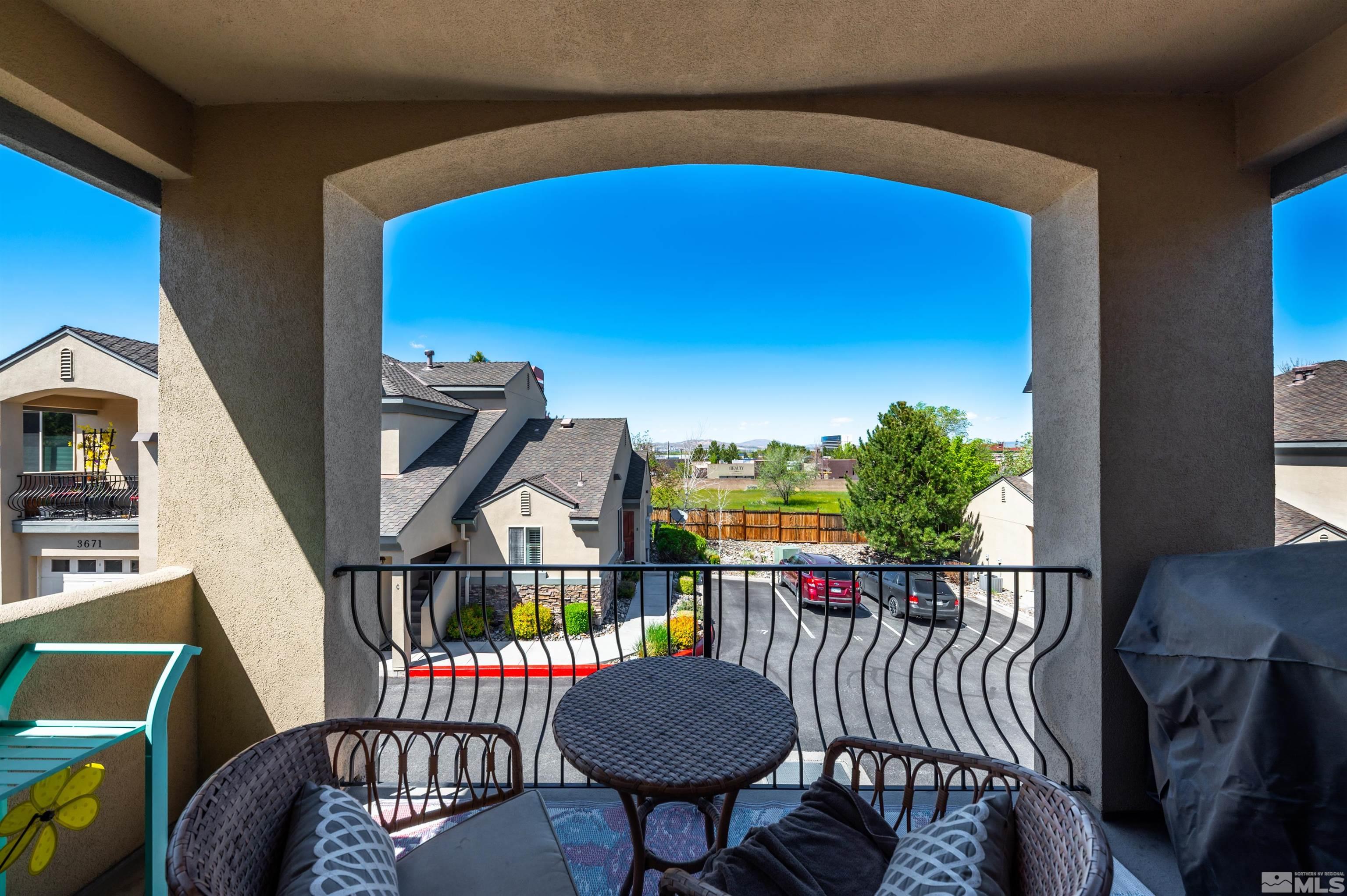 3677 Warren Way, Unit C Reno, NV 89509 - Photo 17 of 23 a view of a balcony and chair