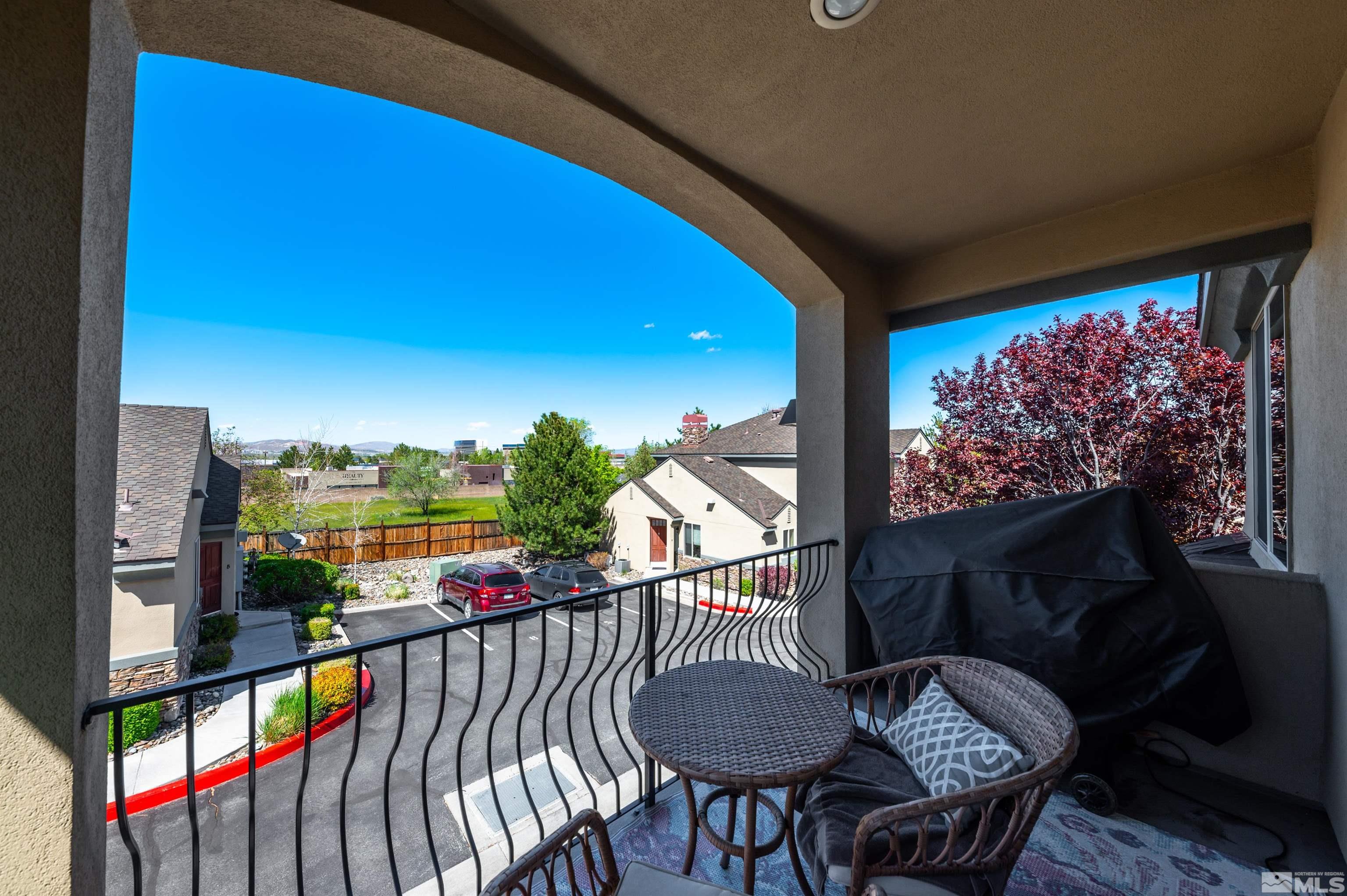 3677 Warren Way, Unit C Reno, NV 89509 - Photo 18 of 23 a view of a balcony with furniture