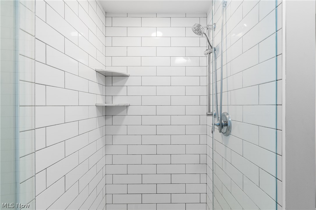 4503 Groveland Road University Heights, OH 44118 - Photo 21 of 31 Bathroom with tiled shower