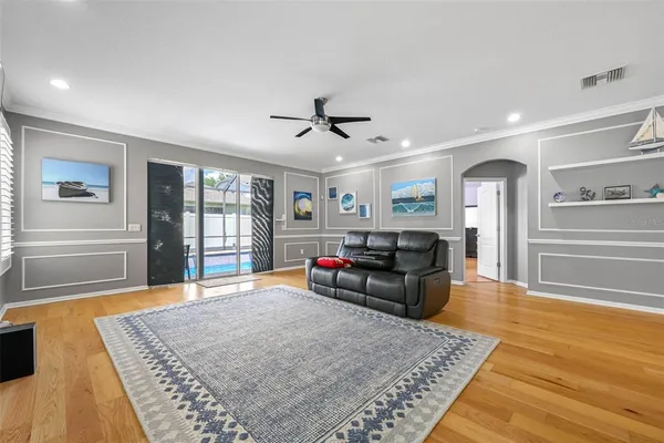 a living room with furniture and a rug