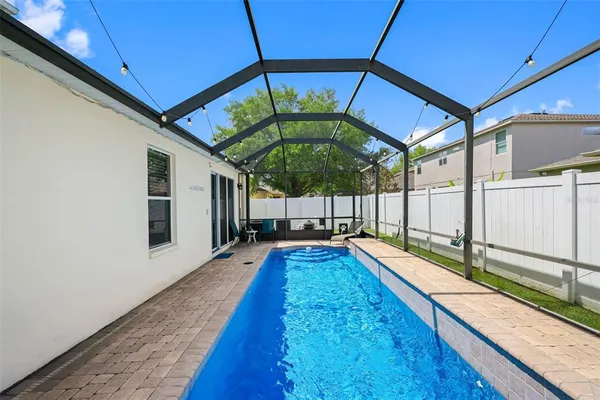 a view of a backyard with a tub