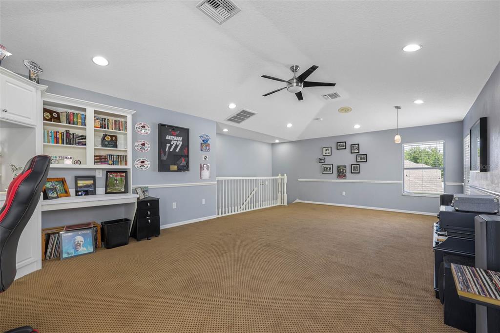 2510 Cross More Street Valrico, FL 33594 - Photo 37 of 43 a view of a livingroom with furniture and a ceiling fan
