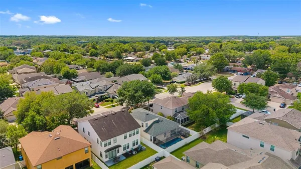a view of houses with outdoor space and swimming pool