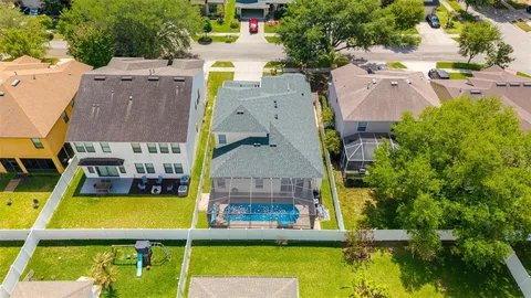an aerial view of a house with a garden