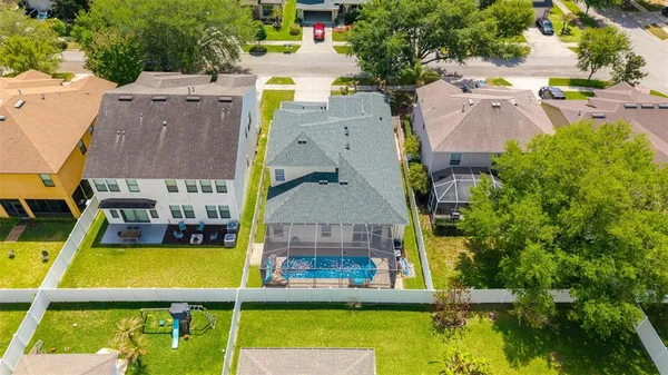 an aerial view of a house with a garden