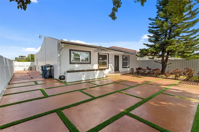a view of a house with a patio