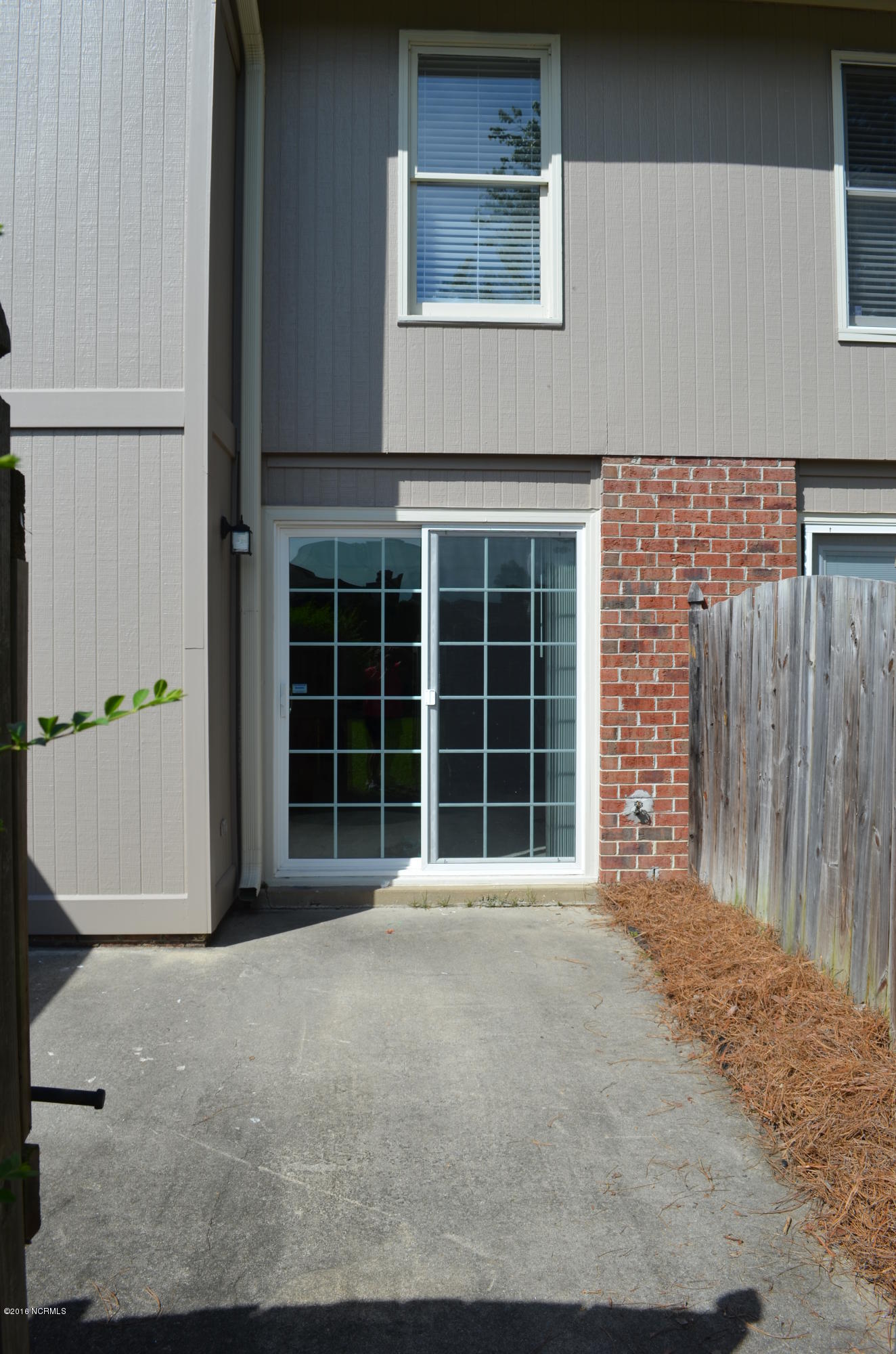 1968 Quail Ridge Road, Unit C Greenville, NC 27858 - Photo 25 of 32 25 back Patio
