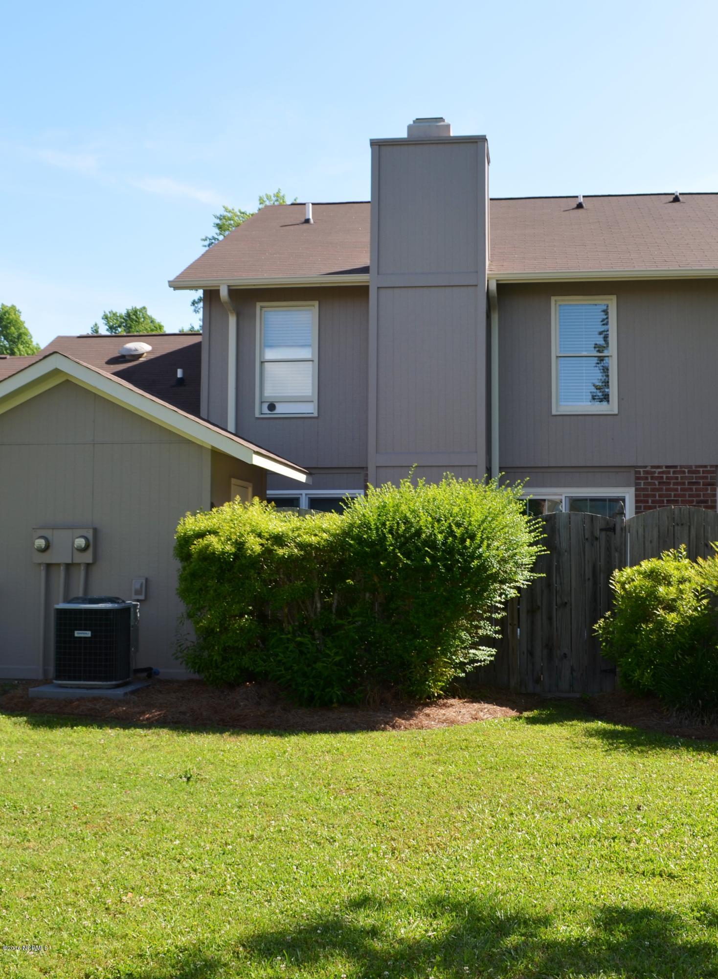 1968 Quail Ridge Road, Unit C Greenville, NC 27858 - Photo 29 of 32 29 Rear