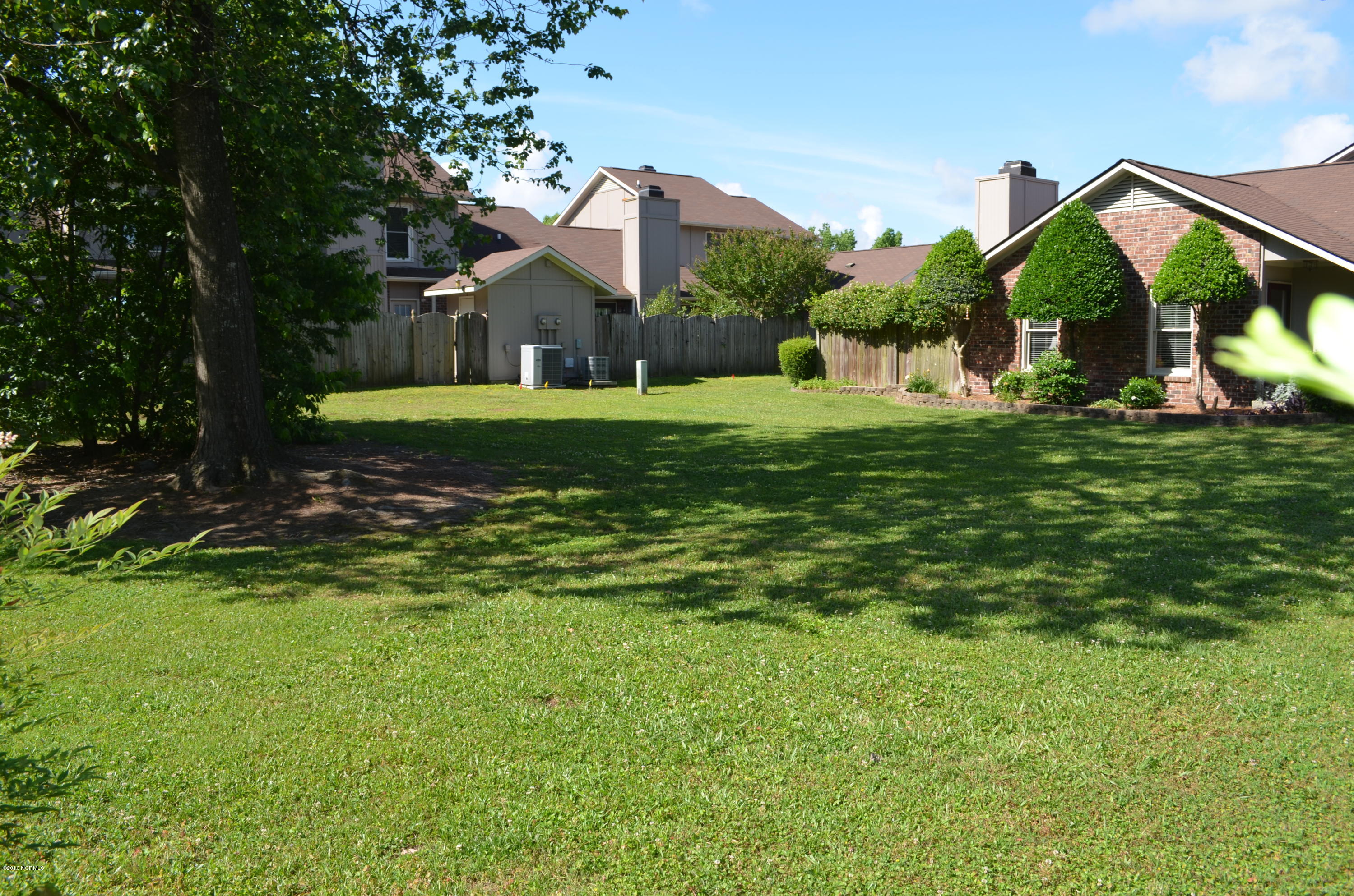 1968 Quail Ridge Road, Unit C Greenville, NC 27858 - Photo 30 of 32 30 Rear yard