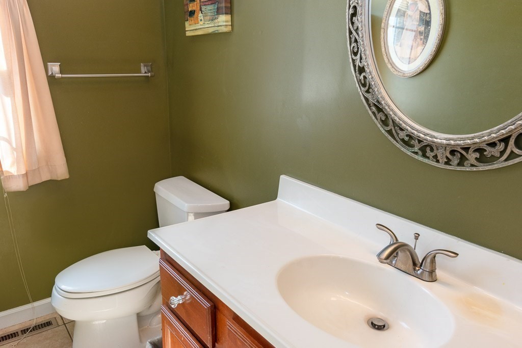 13 Annies Way Springfield, MA 01119 - Photo 13 of 42 a bathroom with a sink and a mirror
