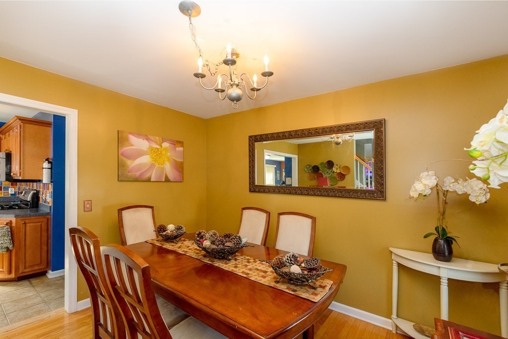 13 Annies Way Springfield, MA 01119 - Photo 8 of 42 a view of a dining room with furniture and wooden floor