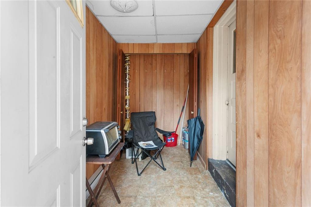 425 Braddock Road Pittsburgh, PA 15221 - Photo 25 of 39 a dining room with furniture and a window