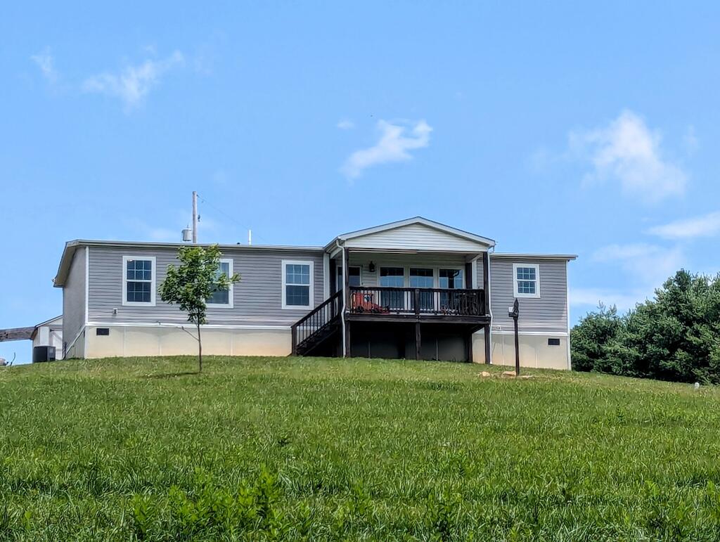 515 Windsor Road Northwest Willis, VA 24380 - Photo 1 of 30 a view of a house with a yard