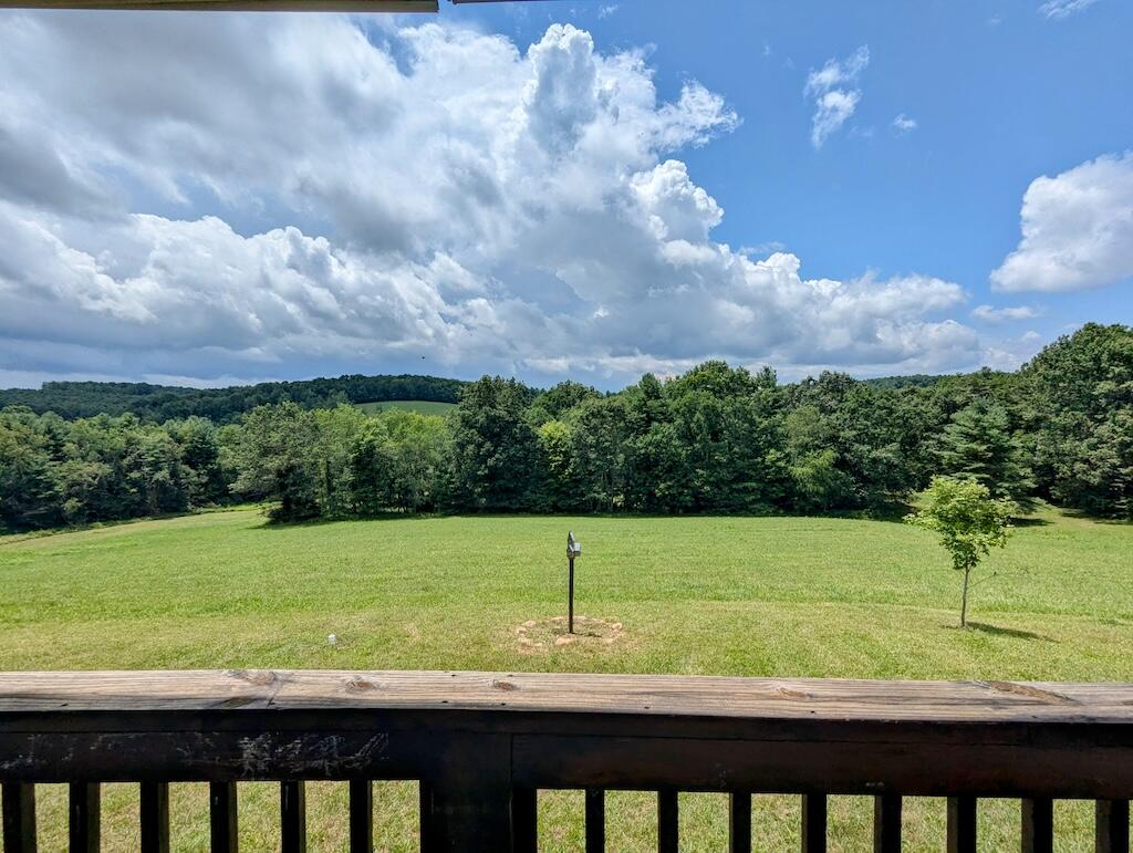 515 Windsor Road Northwest Willis, VA 24380 - Photo 14 of 30 a view of a yard with an outdoor seating