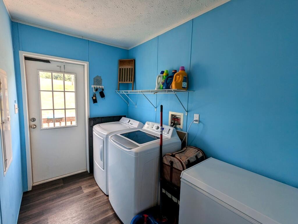 515 Windsor Road Northwest Willis, VA 24380 - Photo 17 of 30 a utility room with dryer and washer