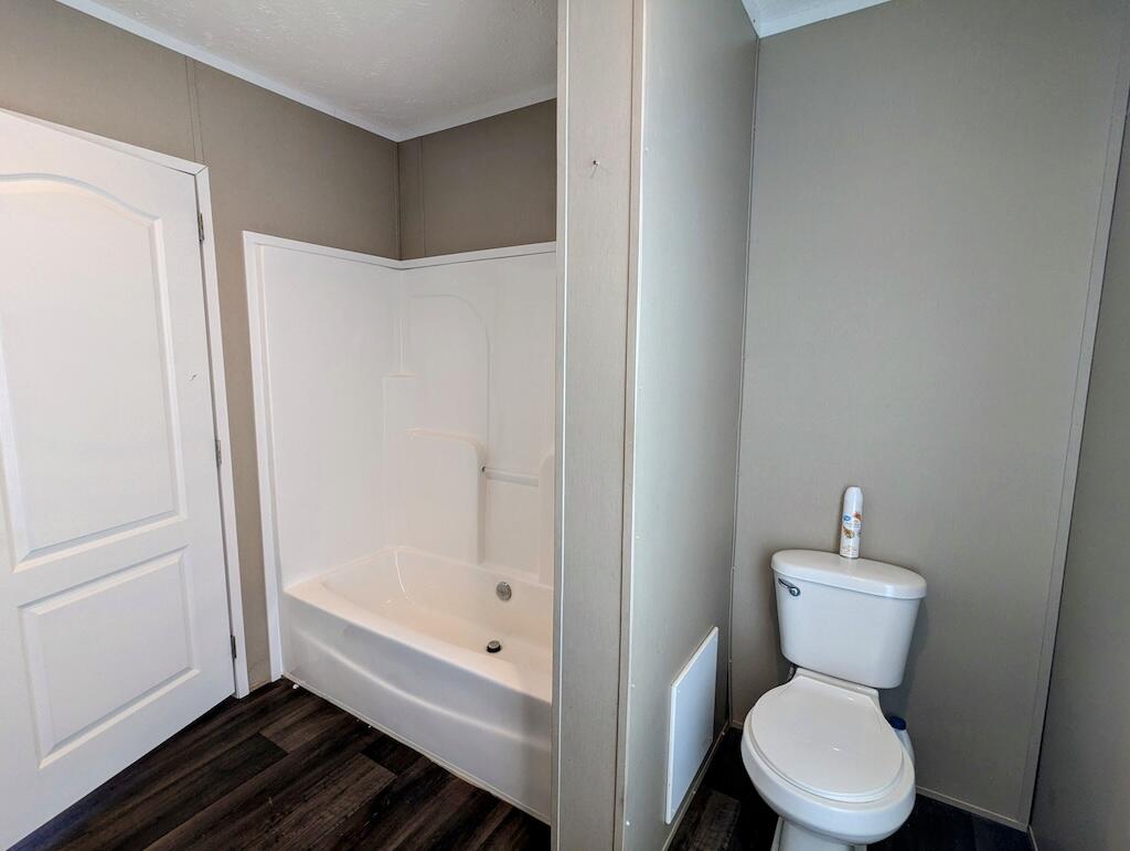 515 Windsor Road Northwest Willis, VA 24380 - Photo 19 of 30 a bathroom with a toilet and a shower