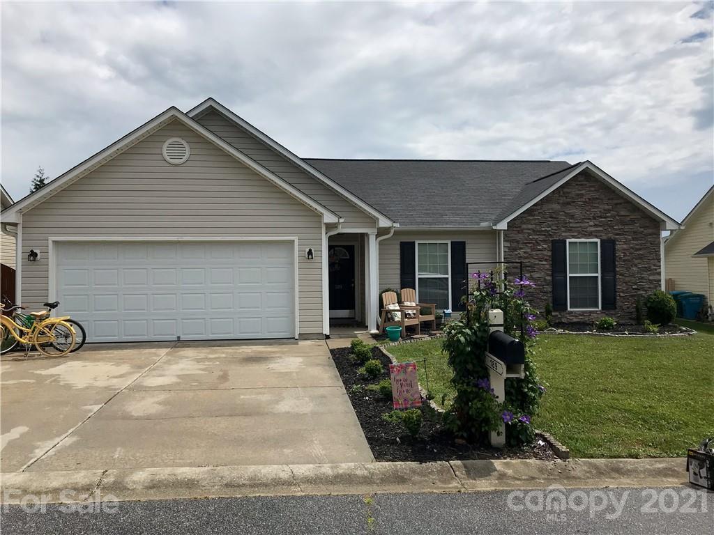 189 Pamlico Road Fletcher, NC 28732 - Photo 1 of 12 a front view of house with yard outdoor seating and barbeque oven