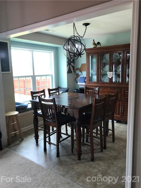 189 Pamlico Road Fletcher, NC 28732 - Photo 6 of 12 a view of a dining room with furniture and window