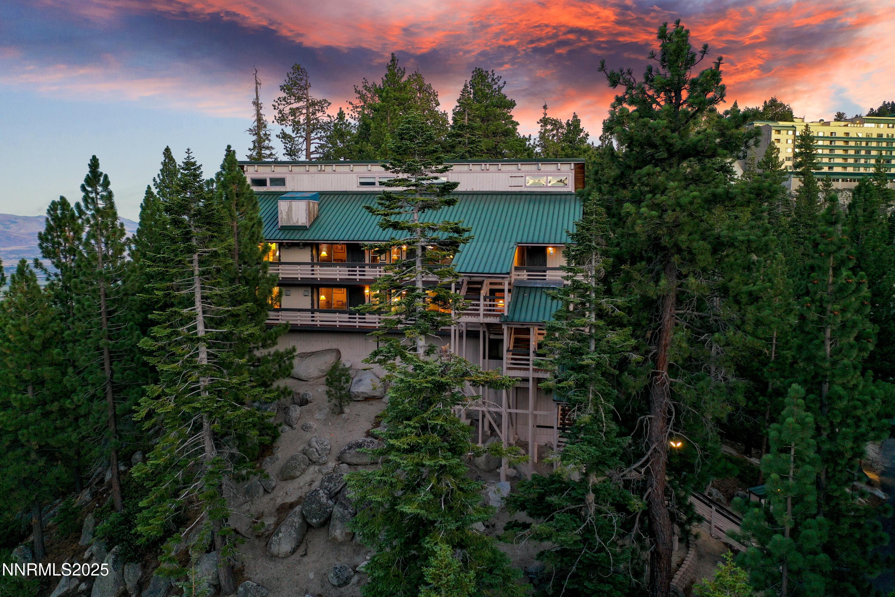 305 Galaxy Lane, Unit 2 Stateline, NV 89449 - Photo 15 of 46 a view of a house with a yard