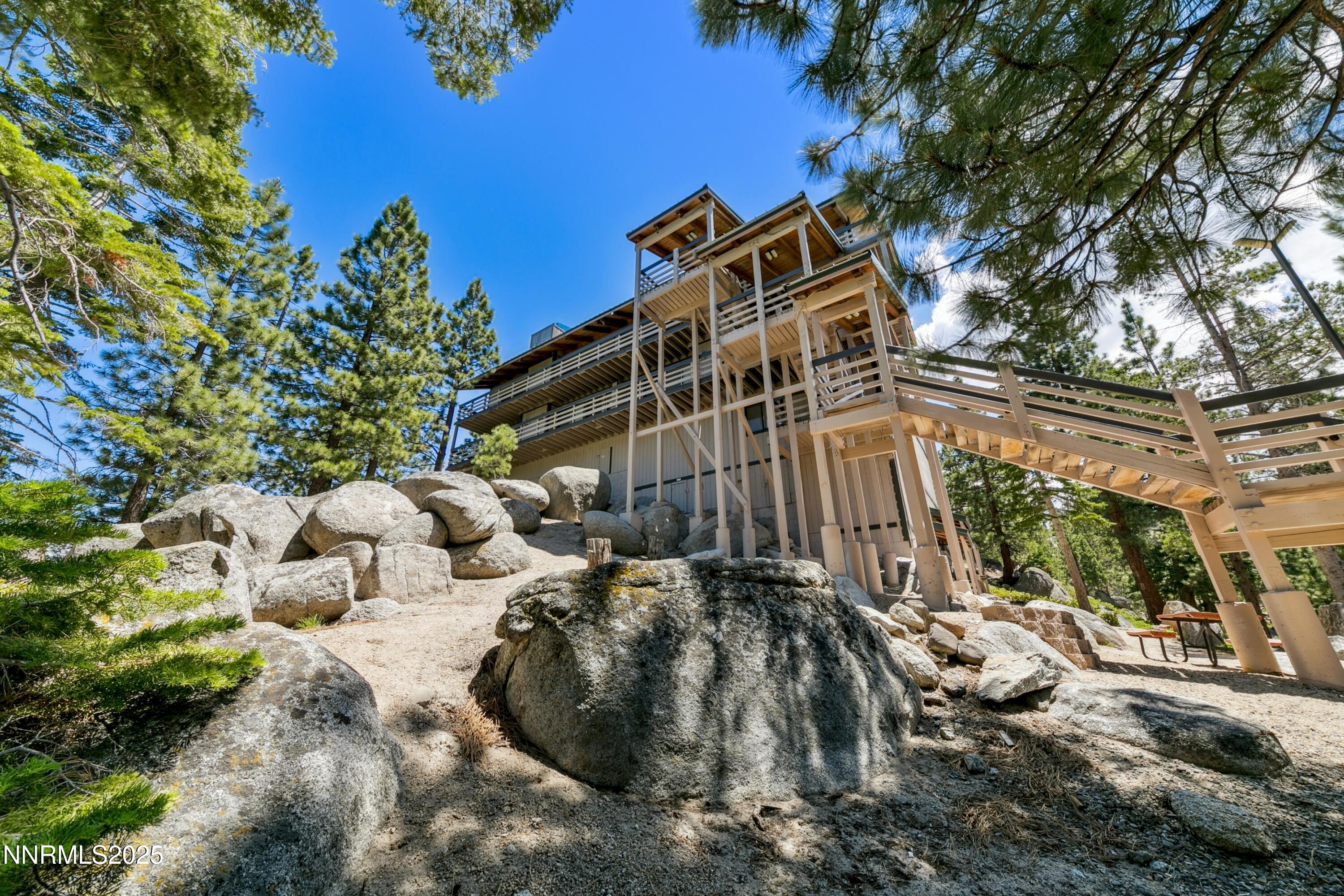 305 Galaxy Lane, Unit 2 Stateline, NV 89449 - Photo 23 of 46 a view of a house with a yard