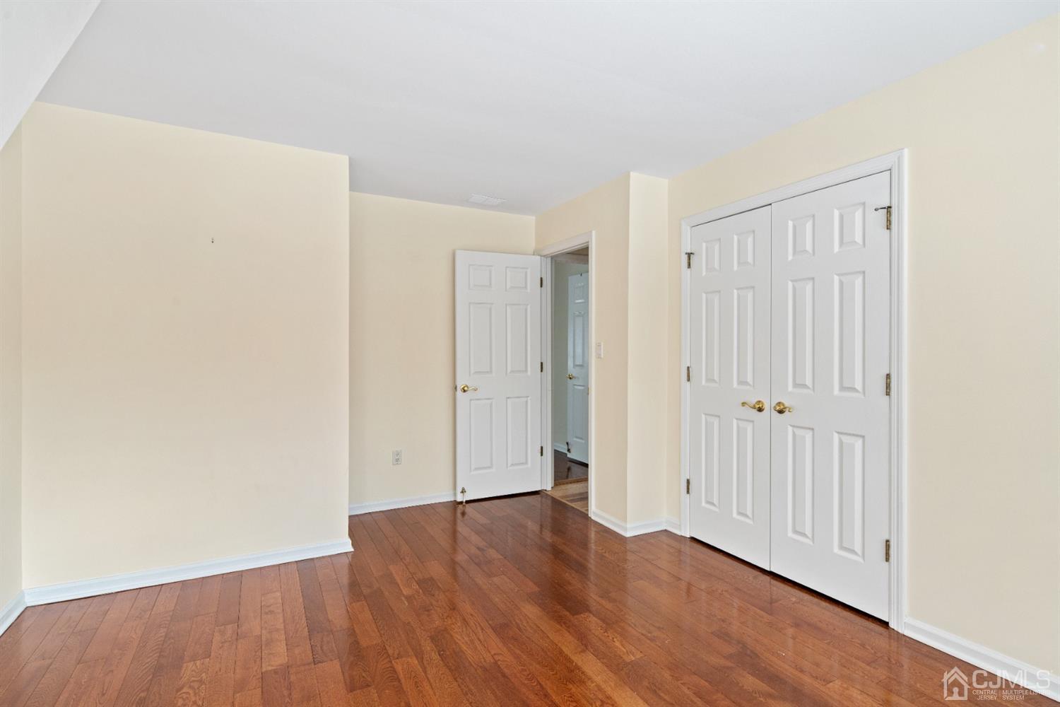238 Dey Road Cranbury, NJ 08512 - Photo 29 of 42 an empty room with wooden floor