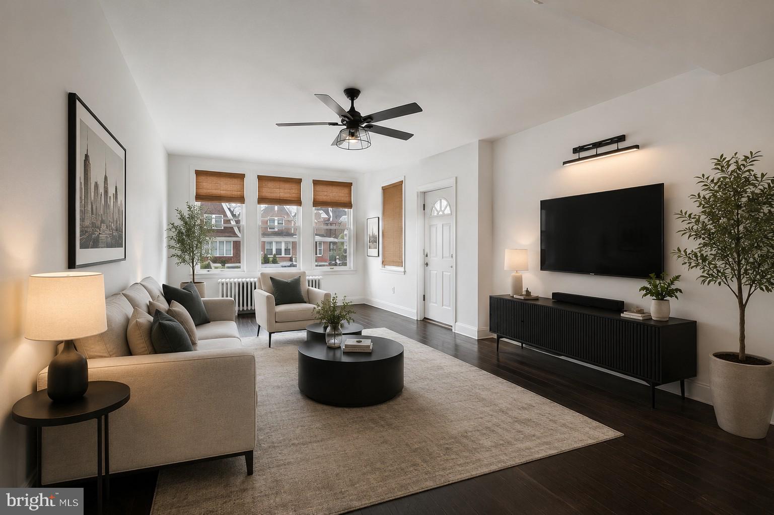 2467 79th Avenue, Unit 1 Philadelphia, PA 19150 - Photo 3 of 16 a living room with furniture and a flat screen tv