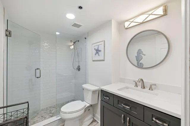 a row of palm trees and swimming pool in the backyard of a house