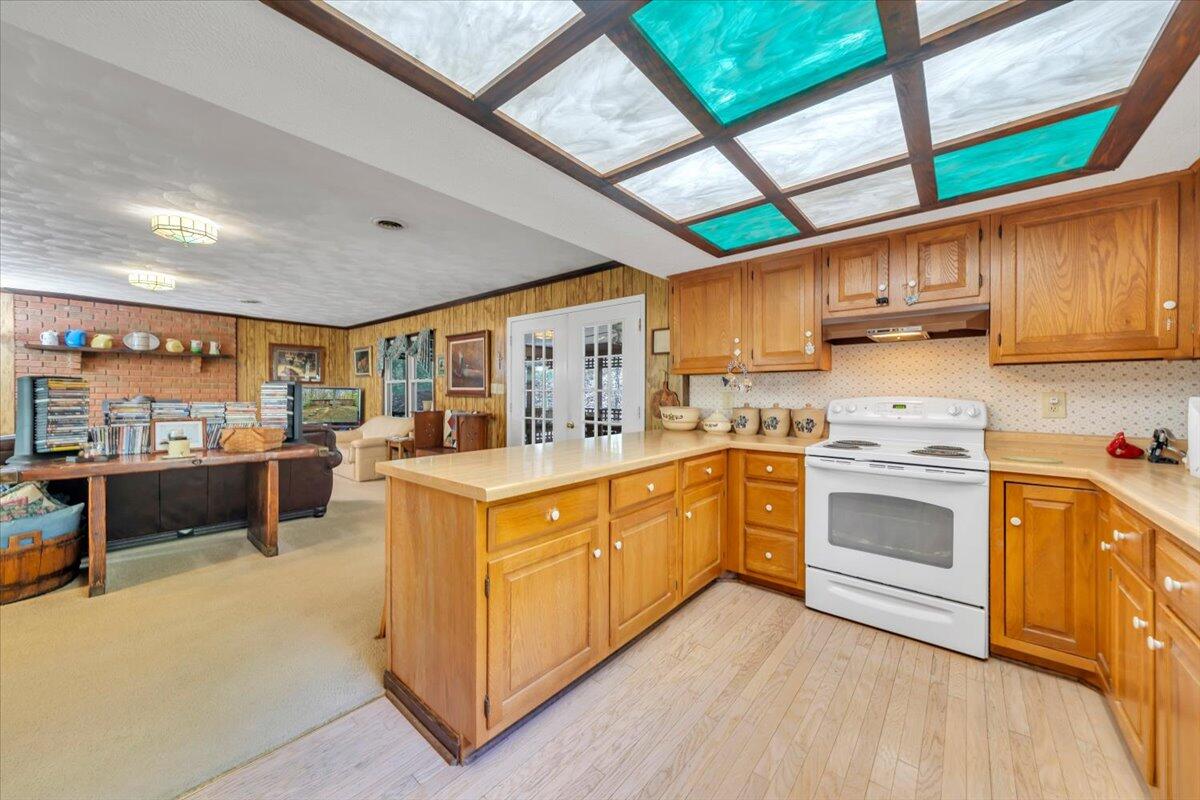 3878 Harborwood Road Salem, VA 24153 - Photo 22 of 60 a kitchen with stainless steel appliances granite countertop a stove and a refrigerator