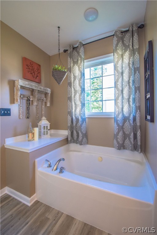 9330 Springmount Terrace Chesterfield, VA 23832 - Photo 21 of 38 a white bath tub sitting next to a window