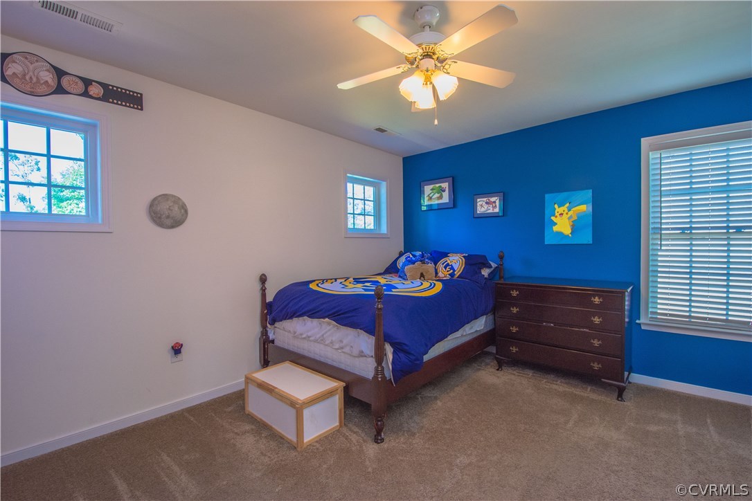 9330 Springmount Terrace Chesterfield, VA 23832 - Photo 30 of 38 a bed room with a bed and a window